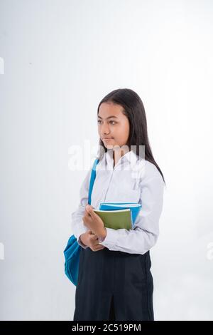 Schöne indonesische Junior High School Student Porträt trägt blau und weiß Uniform Stockfoto