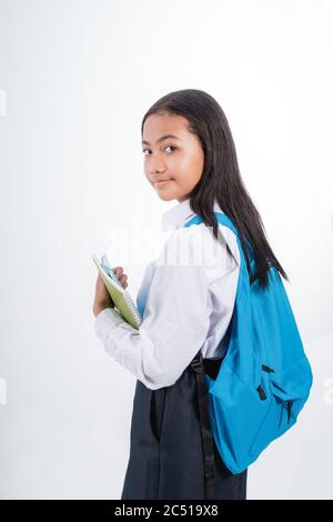 Schöne indonesische Junior High School Student Porträt trägt blau und weiß Uniform Stockfoto