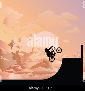 Silhouetted BMX Fahrer Durchführung Stunts vor einem Himmel Dämmerung Hintergrund gesetzt Stockfoto