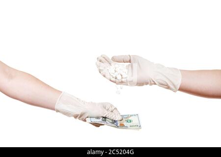 Konzept zum Thema Korruption in der Medizin und Pharmaindustrie Bestechungen, Hände in sterilen medizinischen Handschuhen, eine Hand gibt Geld, die zweite h Stockfoto