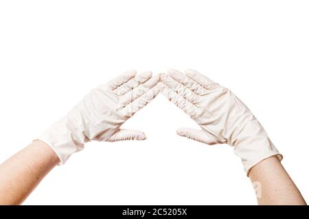 Zwei Hände in einem medizinischen sterilen Handschuhe zeigt Handflächen vor Ihnen, Konzept-Modell isoliert auf weißem Hintergrund mit Kopieplatz. Stockfoto