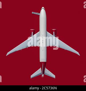 Blick von oben Flugzeug auf rotem Hintergrund Stockfoto