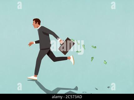 Geschäftsmann läuft mit Aktentasche voller Bargeld Stockfoto