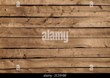 Wand. Alt, verblasst, voller Knoten und Risse im Brett. Stockfoto