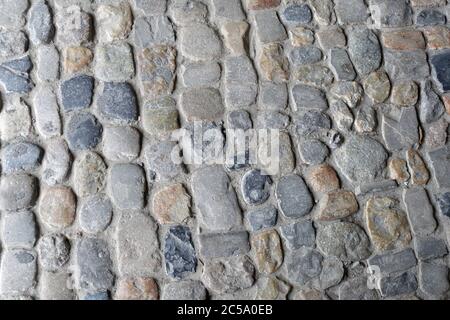 Pflastersteine auf der Straßenoberfläche Stockfoto