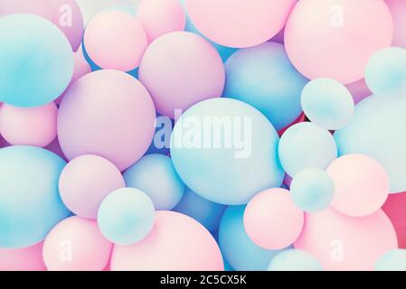 Bunte Luftballons Hintergrund, druckvolle Pastellfarbenen und Soft Focus. Rosa und Mint ballons Foto wand Geburtstag Dekoration Stockfoto