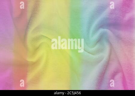Weiches Gewebe in Regenbogenfarben. Mehrfarbige Stoff Textur Hintergrund Stockfoto