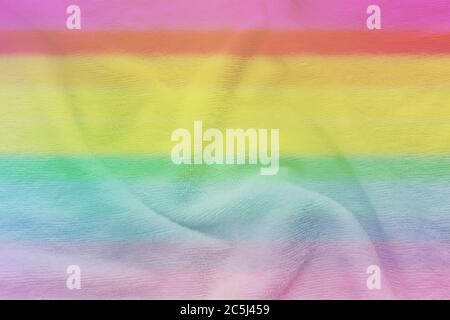 Weiches Gewebe in Regenbogenfarben. Mehrfarbige Stoff Textur Hintergrund Stockfoto