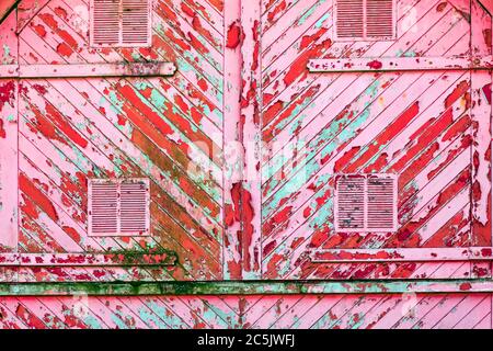 Alte rosa rot verwittert verwitterten Holz Planken Textur Hintergrund Stockfoto