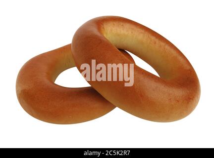 Frisch gebackene Bagels, isoliert auf weißem Hintergrund. Beschneidungspfad enthalten. Stockfoto