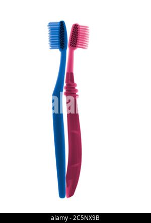Rosa und blaue Zahnbürsten, farbige Röntgenstrahlen. Stockfoto
