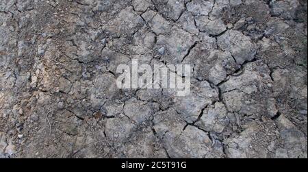 Geknackte Erde Hintergrund in Dürre Saison mit Platz für Kopie Stockfoto