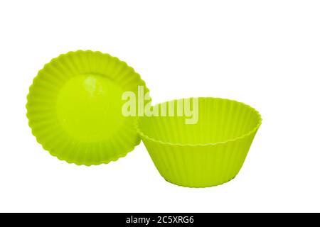 Grüne Silikon Cupcake Backform isoliert auf weißem Hintergrund Stockfoto