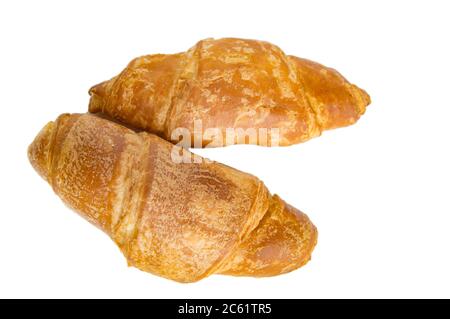 Zwei leckere Croissants isoliert auf weißem Hintergrund durch Schneiden. Stockfoto