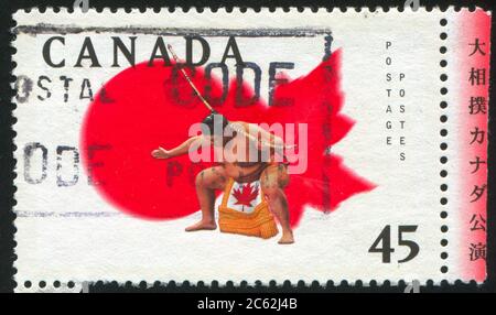 KANADA - UM 1998: Briefmarke gedruckt von Kanada, zeigt Sumo, um 1998 Stockfoto