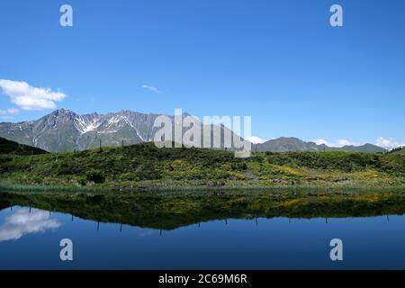 Bischol See am Bischolpass, Beverin, Kanton Graubünden, Schweiz. Stockfoto