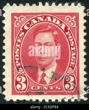 KANADA - UM 1937: Briefmarke gedruckt von Kanada, zeigt George VI, Baumcents, um 1937 Stockfoto