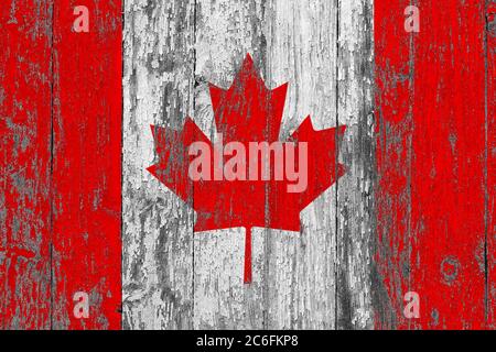 Kanada Flagge auf grunge zerkratzte Holzoberfläche. Nationaler Vintage Hintergrund. Alte Holztisch zerkratzt Flagge Oberfläche. Stockfoto