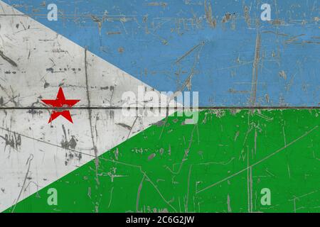 Dschibuti Flagge auf rissige schmutzige Oberfläche gemalt. Nationales Muster auf Vintage-Style-Oberfläche. Verkratzt und verwittert Konzept. Stockfoto
