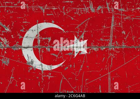 Türkei Flagge auf rissige schmutzige Oberfläche gemalt. Nationales Muster auf Vintage-Style-Oberfläche. Verkratzt und verwittert Konzept. Stockfoto