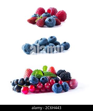 Beeren isoliert auf weißem Hintergrund. Reife Heidelbeeren, Walderdbeeren, Himbeeren, Johannisbeeren, Maulbeeren und Erdbeeren. Hintergrund des Mix berri Stockfoto