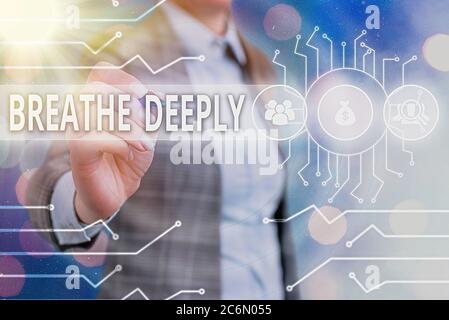 Text in Wort schreiben atmen tief. Business Foto zeigt, um eine Menge Luft in die Lunge zu nehmen inhaleexhale vollständig System Administrator Kontrolle, Ausrüstung Stockfoto