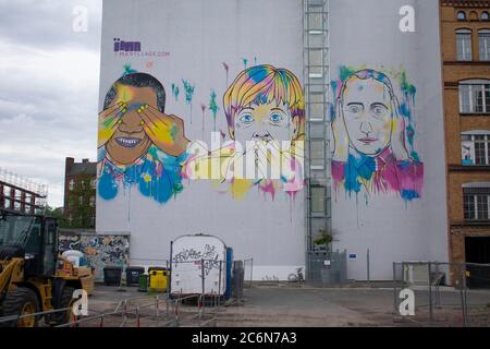 Bunte Graffiti von Angela Merkel Putin und Obama an einer Wand in Friedrichshain Berlin Stockfoto