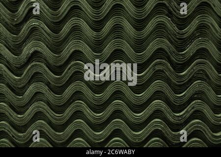Dach grünen Schiefer Fliesen Muster Welle Textur. Stockfoto