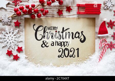 Leuchtend rote Weihnachtsdekoration, Papier, Frohe Weihnachten und EIN glückliches 2021 Stockfoto