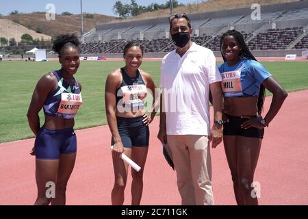 David Glassman (zweiter von rechts) posiert mit Mitgliedern der US-Frauen-Staffel 3 x 100 m während der Zürcher Weltklasse Inspiration Games, Do Stockfoto