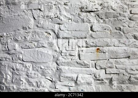 Altmodisch schmutzig grau gemalten Ziegelstein Wand Textur Hintergrund Stockfoto