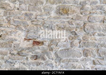 Mittelalterliche Burg stane Wand Textur, Alte Steinmauer Hintergrund der mittelalterlichen Burg. Stockfoto