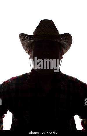 Porträt eines alten Mannes, in einem Cowboy-Hut, mit Bart, Vorderansicht - dunkel isoliert Silhouette Stockfoto