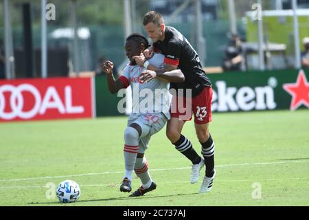 Orlando, Florida, USA. Juli 2020. Toronto FC Spieler Akinola, Ayo #20 Versuch, den Ball während der MLS ist zurück Turnier bei ESPN Wild World of Sports in Orlando Florida am Montag, 13. Juli 2020 zu halten. Bildnachweis: Marty Jean-Louis Kredit: Marty Jean-Louis/Alamy Live Nachrichten Stockfoto