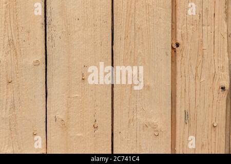 Hintergrund aus Holzbrettern. Holzbretter in beige Farbe lackiert. Stockfoto