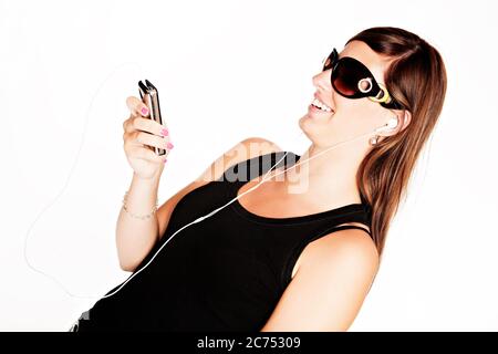 Eine junge Frau mit dem iPod. (CTK Foto/Josef Horazny, Martin Sterba) Stockfoto