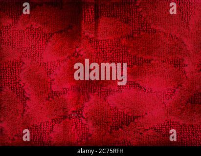 Roter Teppich abstrakter Hintergrund. Wollarbeiten im Teppich Stockfoto