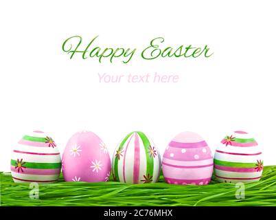 Rosa, blaue und grüne ostereier auf weißem Hintergrund Stockfoto