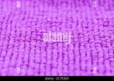 Hintergrund aus lila Microfaser-Qualität, selektiver Fokus. Stockfoto