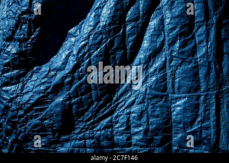 Horizontale Aufnahme einer blauen Steppdecke. Es ist eine perfekte Passform für ein Hintergrundbild Stockfoto