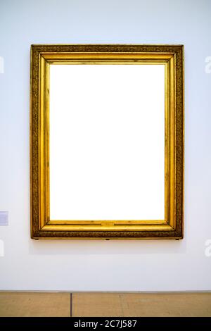 Vertikale Aufnahme eines hellen weißen Blattes in einem gerahmt goldener Rahmen Stockfoto