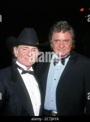 Johnny Cash und Willie Nelson bei der Eröffnung des Gene Autry Museums in Los Angeles, CA Stockfoto