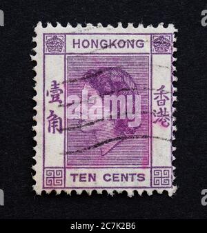 Hongkong, Britische Kronkolonie - 10 Cent 10c Briefmarke mit Porträt von Königin Elizabeth II. 1954 Stockfoto