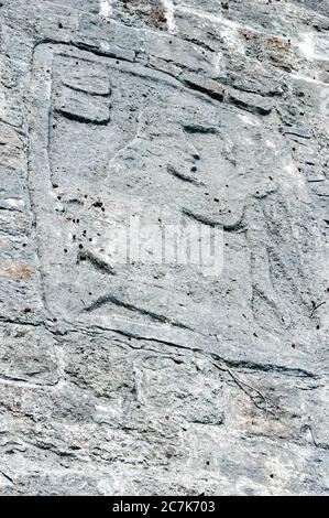 Detail einer Bas Relief Maya Wand Schnitzerei auf den Ruinen von Cozumel, Mexiko. Stockfoto