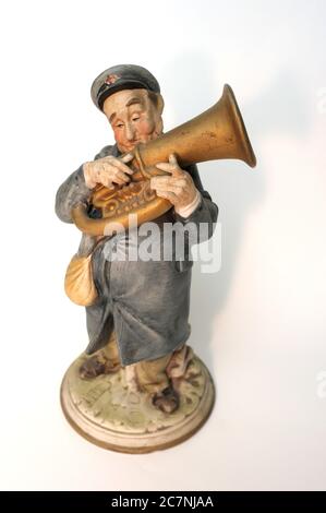 Biskuit Porzellanfigur, Musiker spielt die Posaune, Stockfoto