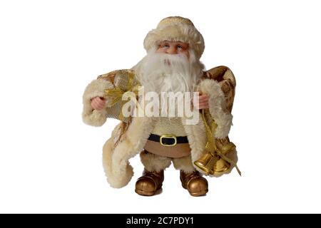 Figur des Weihnachtsmanns in goldenen Kleidern hält eine Glocke und eine Tasche mit Geschenken, auf weißem Hintergrund isolieren Stockfoto