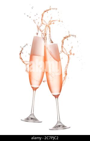 Klirrende Gläser Champagner mit Spritzer auf weißem Hintergrund Stockfoto
