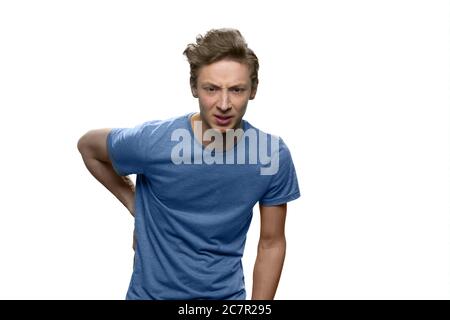 Junge Teenager leiden unter Rückenschmerzen. Stockfoto