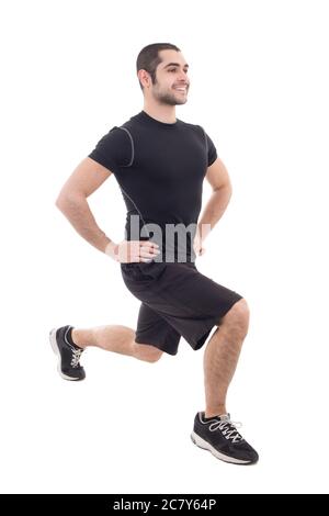 Schöner bärtiger arabischer Mann in Sportkleidung Erwärmung vor dem Training isoliert auf weißem Hintergrund Stockfoto