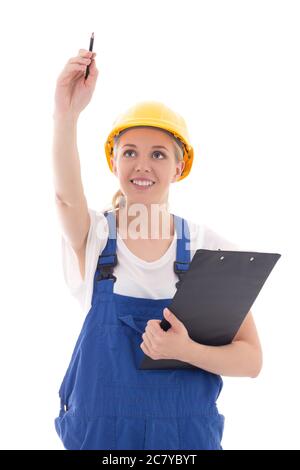 Frau in blauer Bauuniform mit Zwischenablage Schreiben etwas isoliert auf weißem Hintergrund Stockfoto